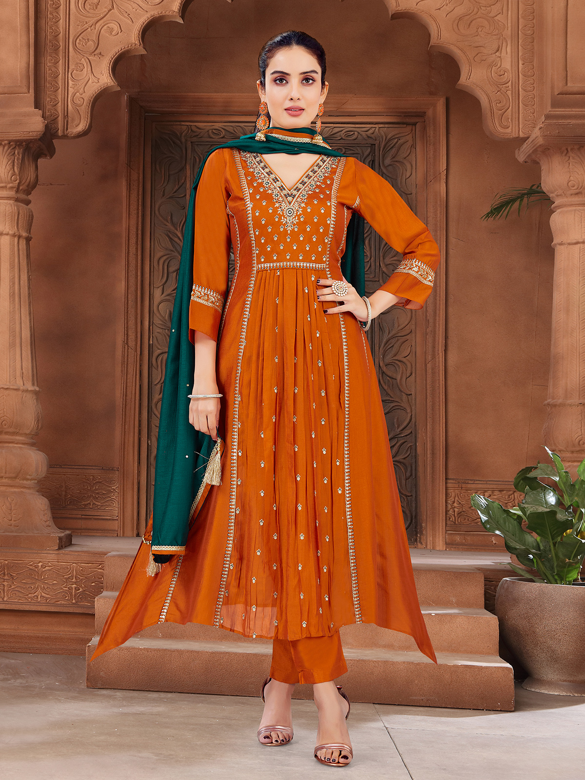 orange punjabi dress Radiance in Tradition , Step into elegance with this stunning boutique Punjabi suit a perfect blend of vibrant orange hues, intricate prints, and timeless charm. A must-have for festive and